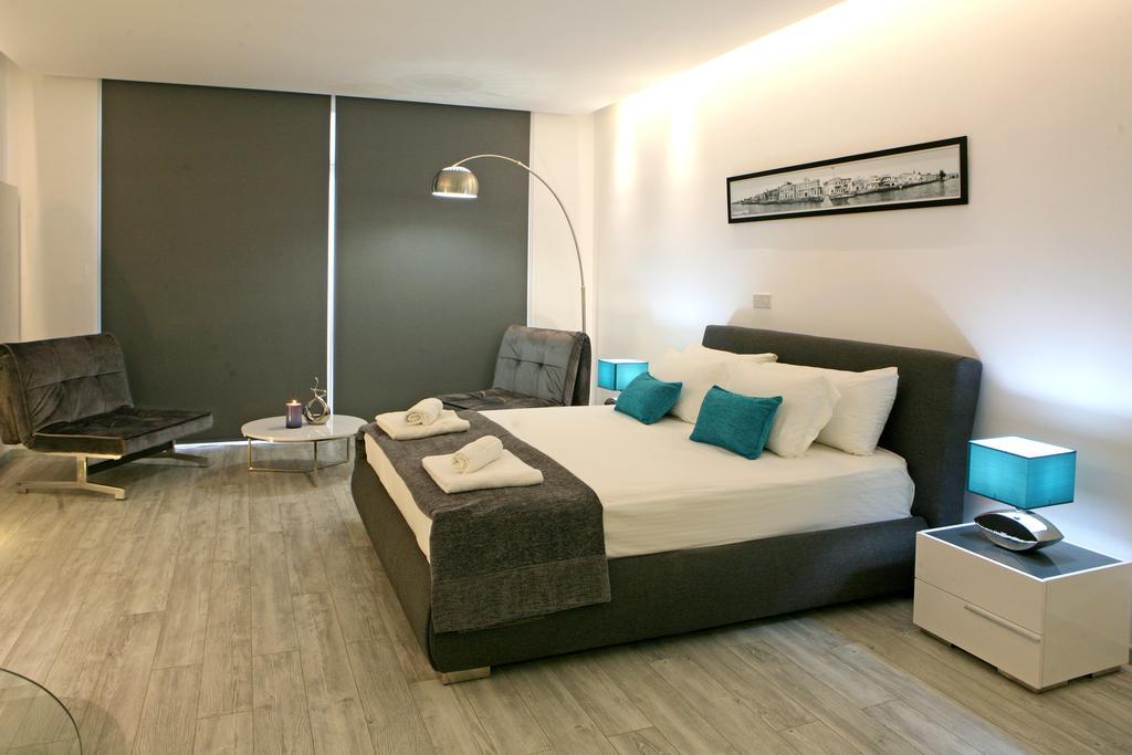 Corina Suites & Apartments Limassol Phòng bức ảnh